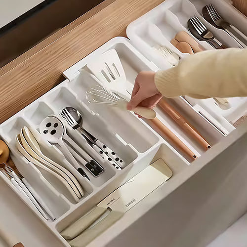 Organizador de cajón extensible y ajustable para una cocina