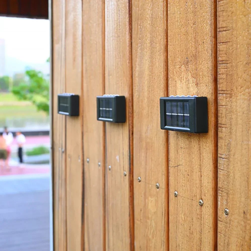 Lámpara de pared solar LED para exterior | Detector de movimiento con iluminación hacia arriba y hacia abajo | Negro