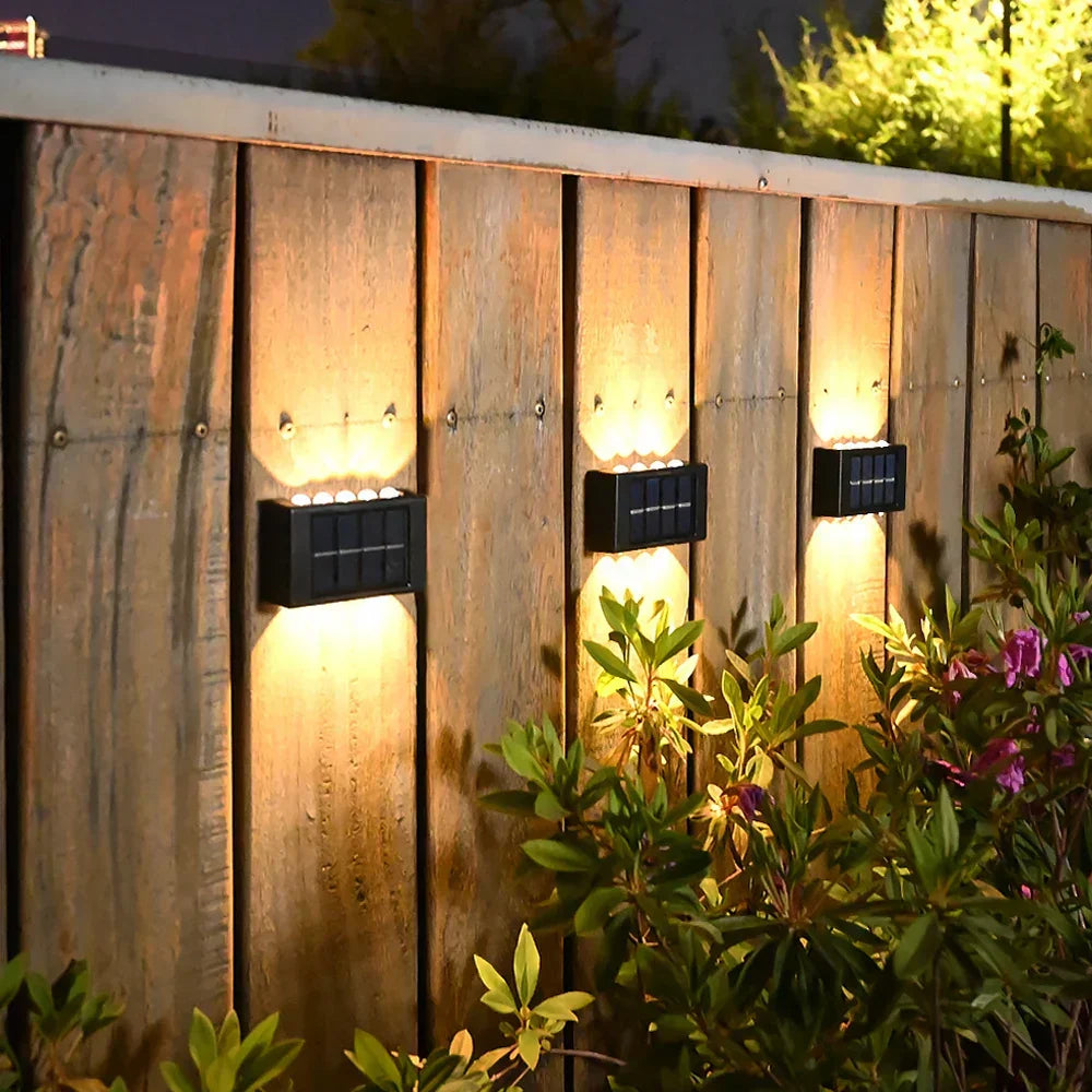 Lámpara de pared solar LED para exterior | Detector de movimiento con iluminación hacia arriba y hacia abajo | Negro