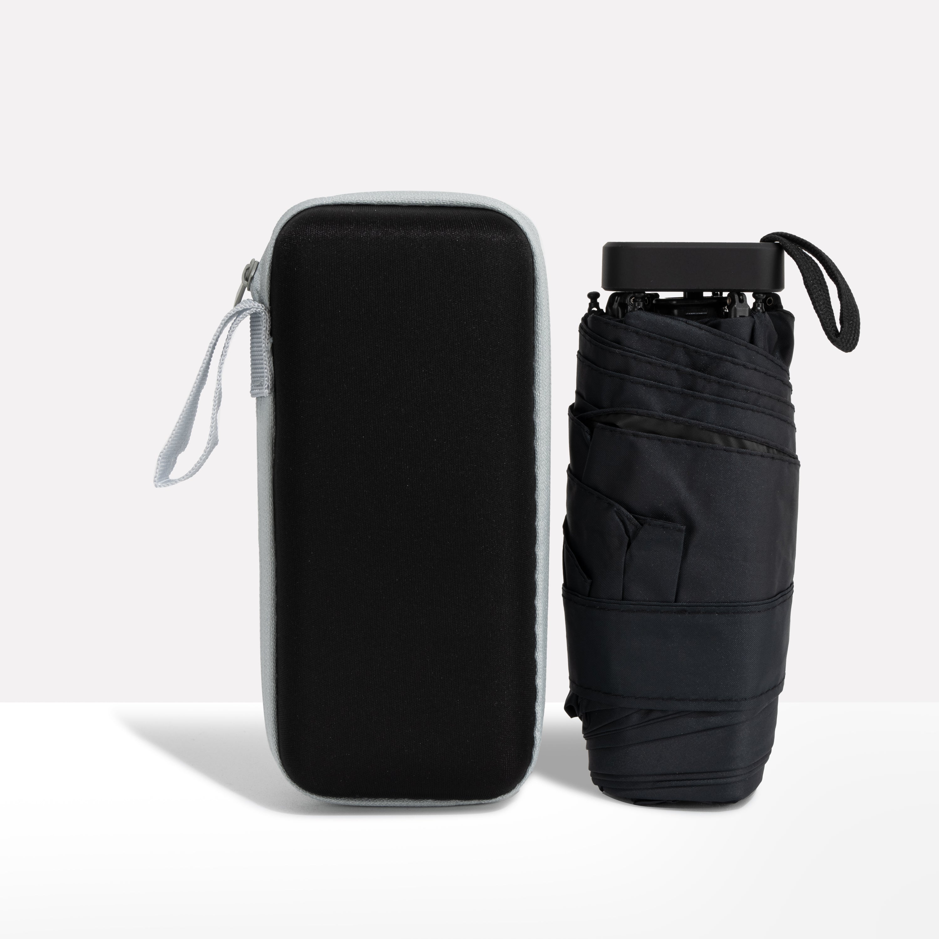 Paraguas de viaje compacto con funda impermeable – resistente al viento y ultraligero