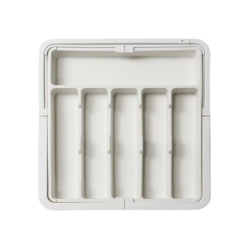 Organizador de cajón extensible y ajustable para una cocina