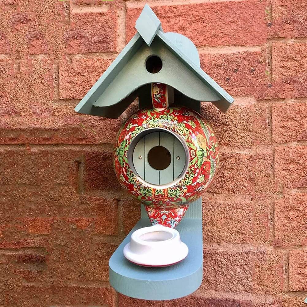 Casa de alimentación para aves en forma de tetera