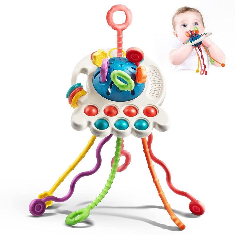 Ufo Bloom – Juguete clásico para bebés en forma de un OVNI con cuerdas para tirar y botones laterales táctiles