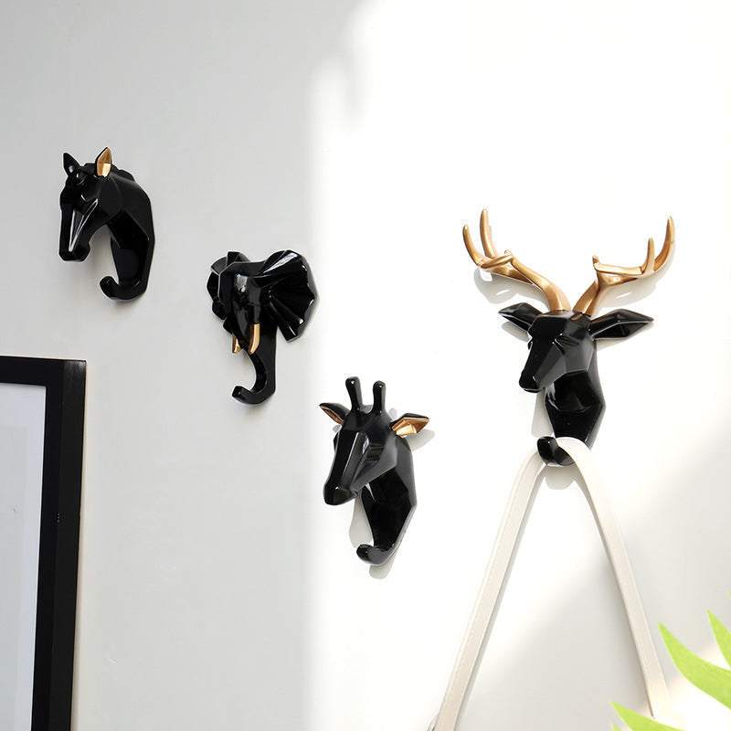 Gancho de pared en forma de cabeza de animal