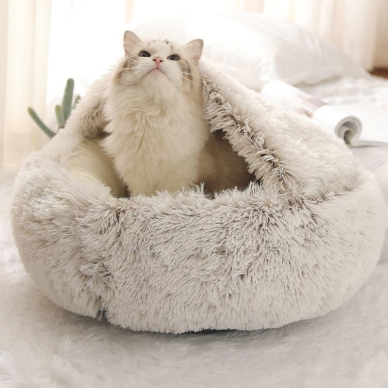 PawNest – Cama para mascotas en forma de donut con bordes elevados para aliviar las articulaciones y proporcionar un acogedor soporte para descansar