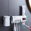 Skanto | Soporte para cepillos de dientes con esterilizador UV inteligente, dispensador de pasta de dientes montado en la pared