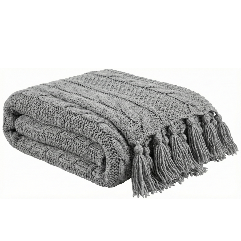 Manta de punto gris suave con bordes con flecos