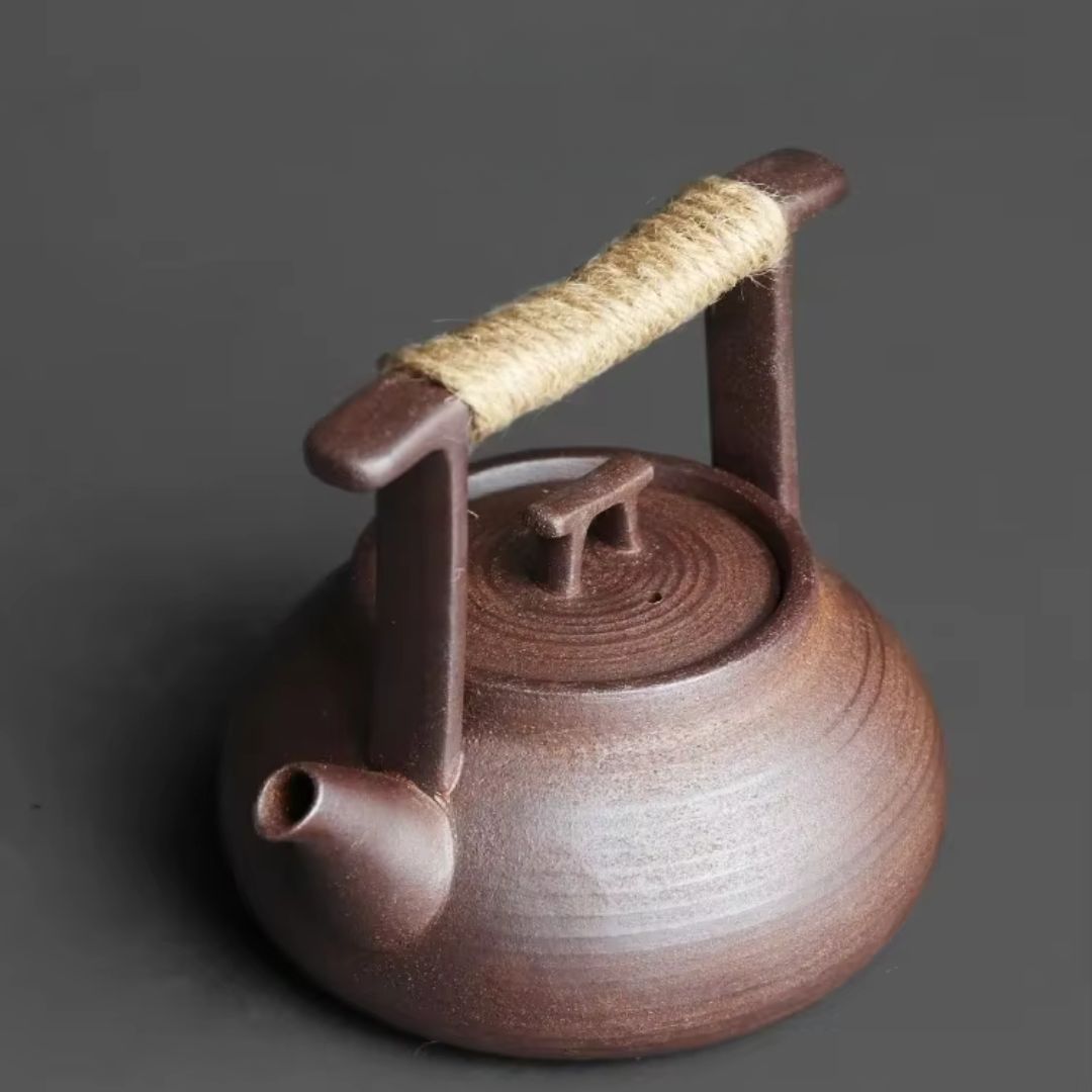 Tetera de Cerámica con Soporte Térmico para Momentos de Té Relajantes en Casa