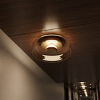 Luz de Pared Halo - Aplique Escultórico Moderno con Brillo en Capas y Plato de Vidrio
