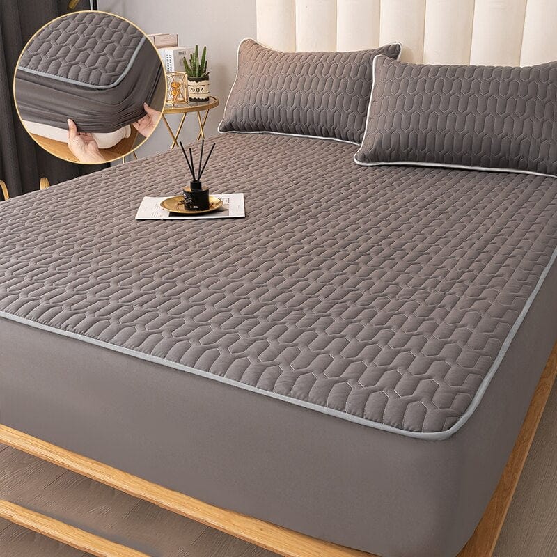 AquaSlumber – Protector de colchón de lujo con comodidad impermeable y acolchada
