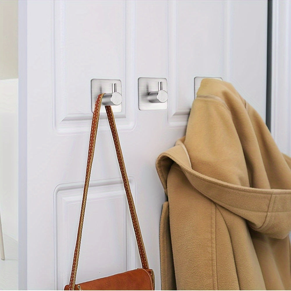 Set de Ganchos de Pared Autoadhesivos de Acero Inoxidable de 4 Piezas – Minimalista, Potente y Resistente al Agua