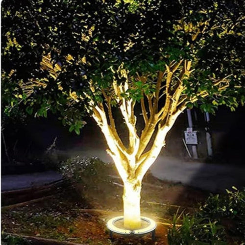 Elegante proyector LED de jardín en blanco cálido para iluminar árboles y paisajes