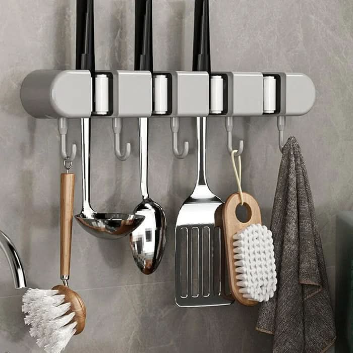 Soporte de pared versátil para herramientas del hogar