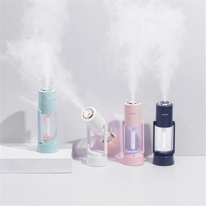 AquaSpin – Humidificador con parte superior redondeada, salida rotativa y base con un botón