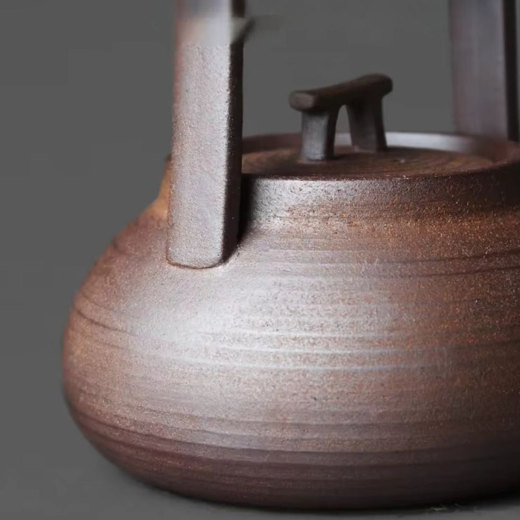 Tetera de Cerámica con Soporte Térmico para Momentos de Té Relajantes en Casa