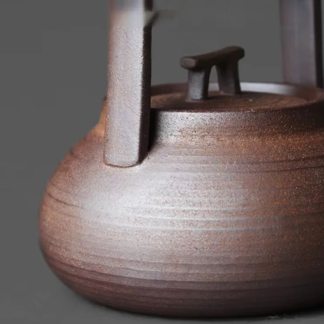 Tetera de Cerámica con Soporte Térmico para Momentos de Té Relajantes en Casa