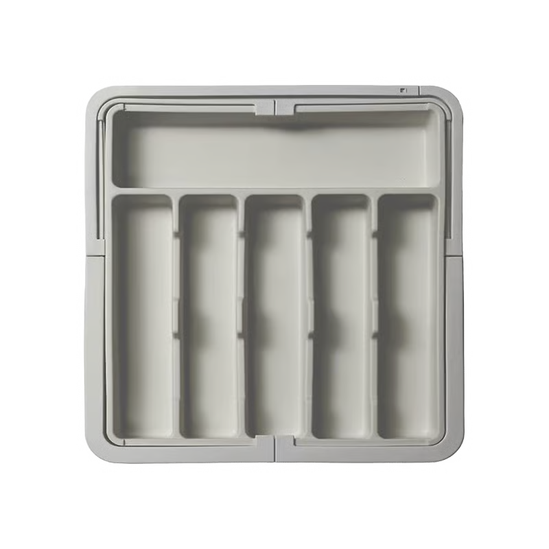 Organizador de cajón extensible y ajustable para una cocina