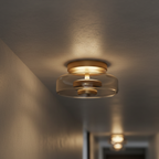 Luz de Pared Halo - Aplique Escultórico Moderno con Brillo en Capas y Plato de Vidrio