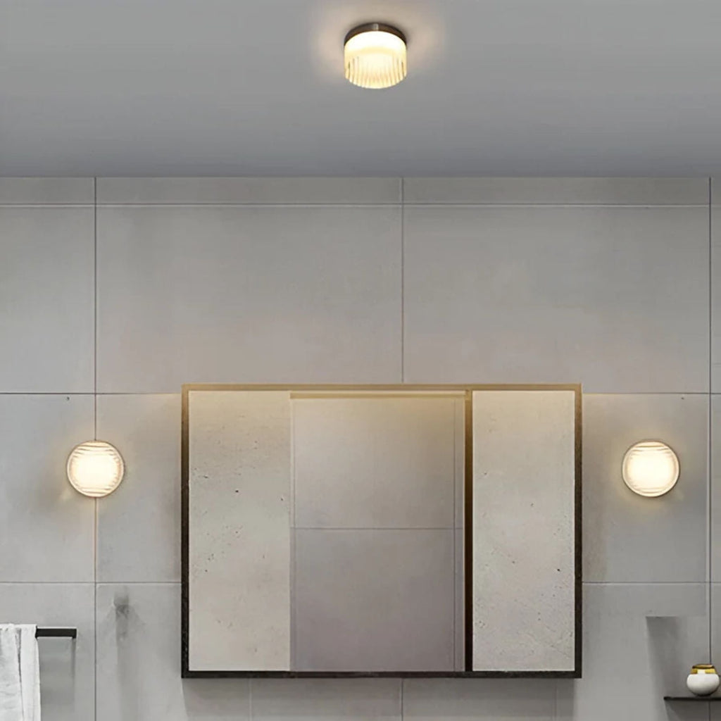 Aplique de pared redondo moderno Ambrelo con vidrio ámbar
