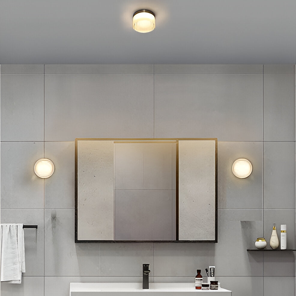 Aplique de pared redondo moderno Ambrelo con vidrio ámbar