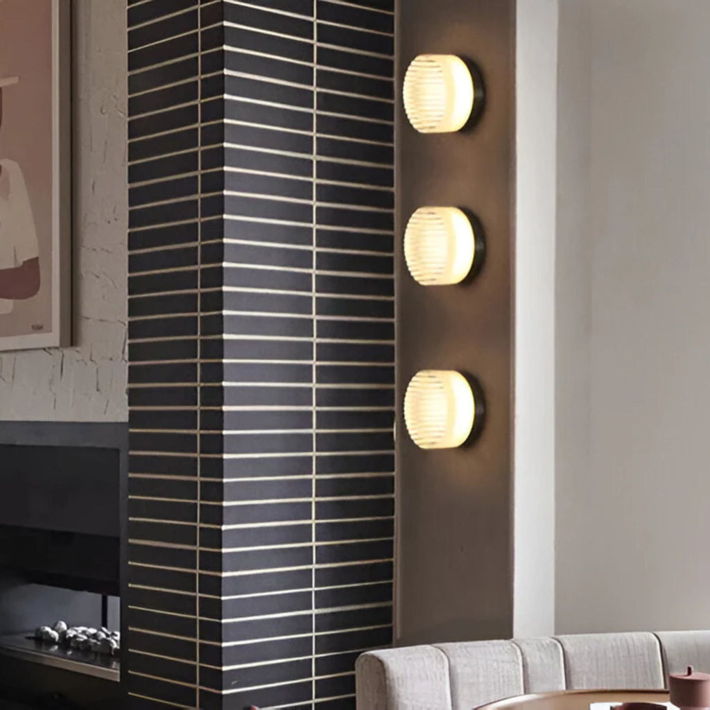 Aplique de pared redondo moderno Ambrelo con vidrio ámbar