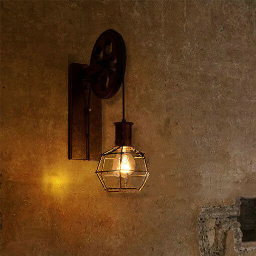Aplique de pared con polea de hierro y acento de rueda