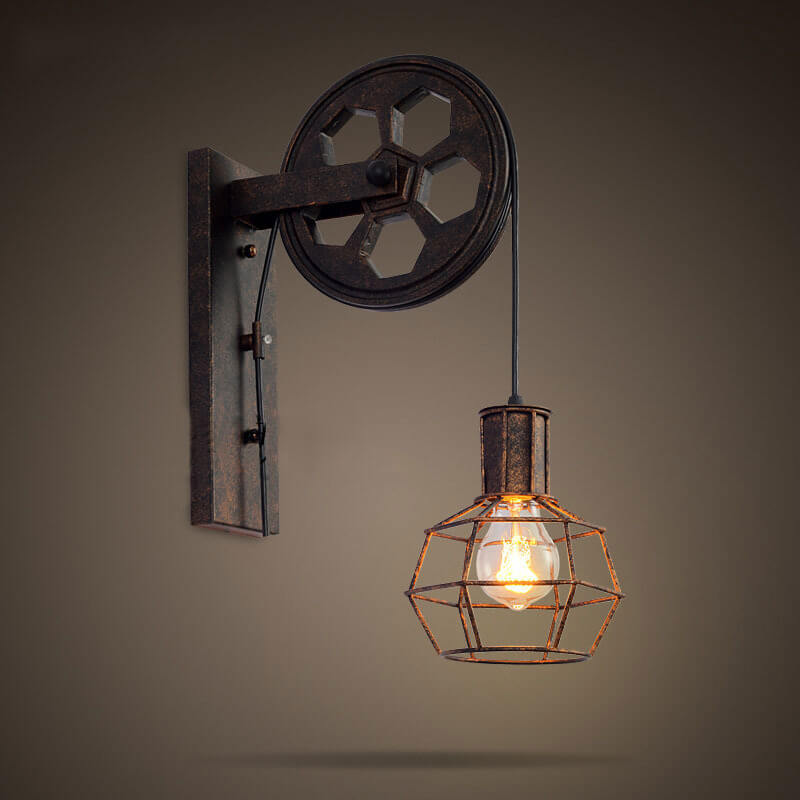 Aplique de pared con polea de hierro y acento de rueda