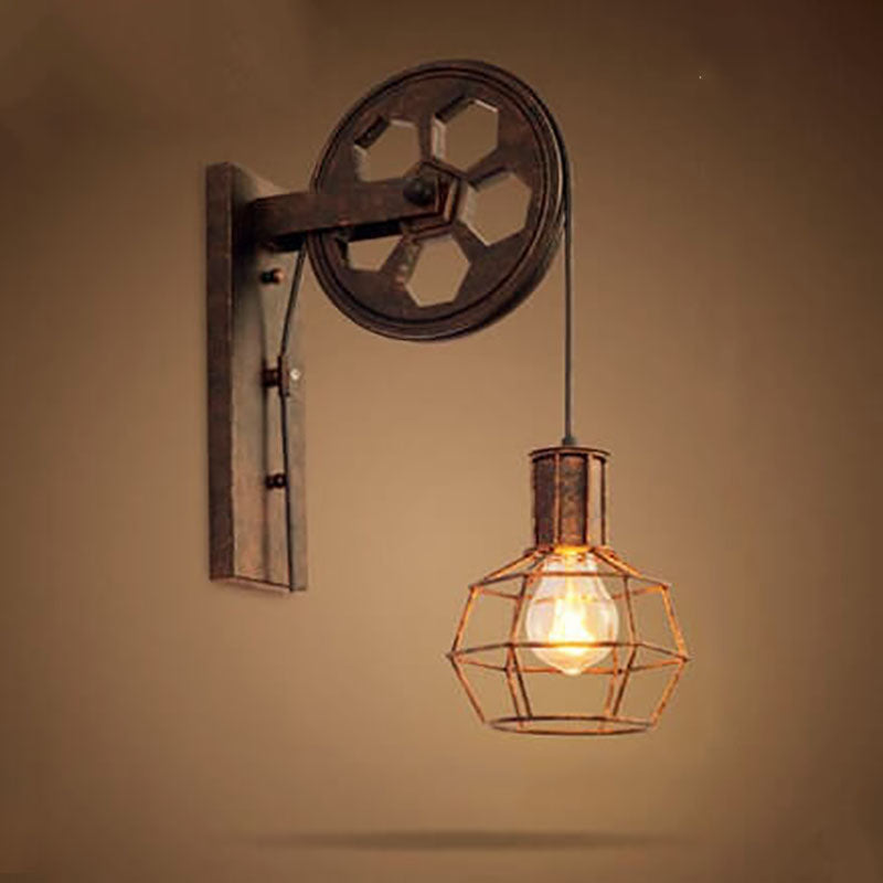 Aplique de pared con polea de hierro y acento de rueda
