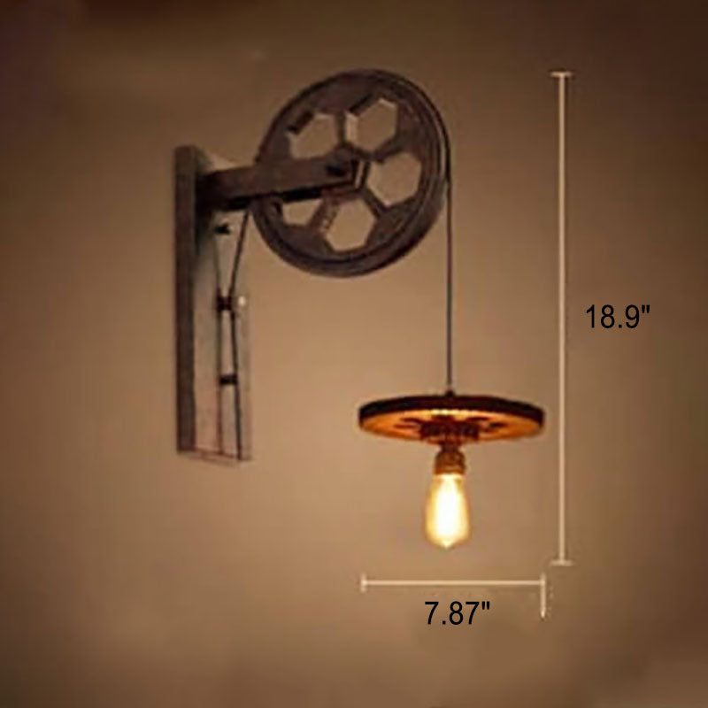 Aplique de pared con polea de hierro y acento de rueda