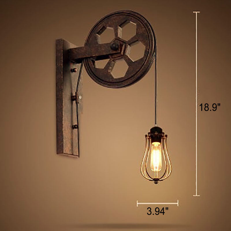 Aplique de pared con polea de hierro y acento de rueda