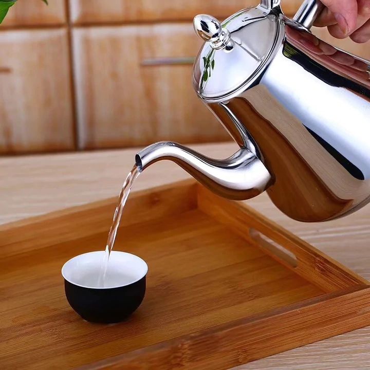 Hervidor de agua de inducción de acero inoxidable con filtro - Cocción rápida y diseño sostenible para el hogar