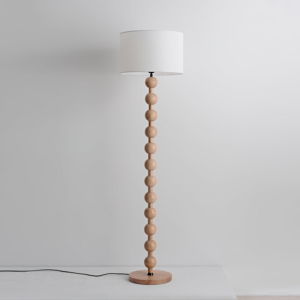 Lámpara de Pie Escultural Hugo – Luz de Piso Moderna con Esferas de Madera para Espacios de Vida