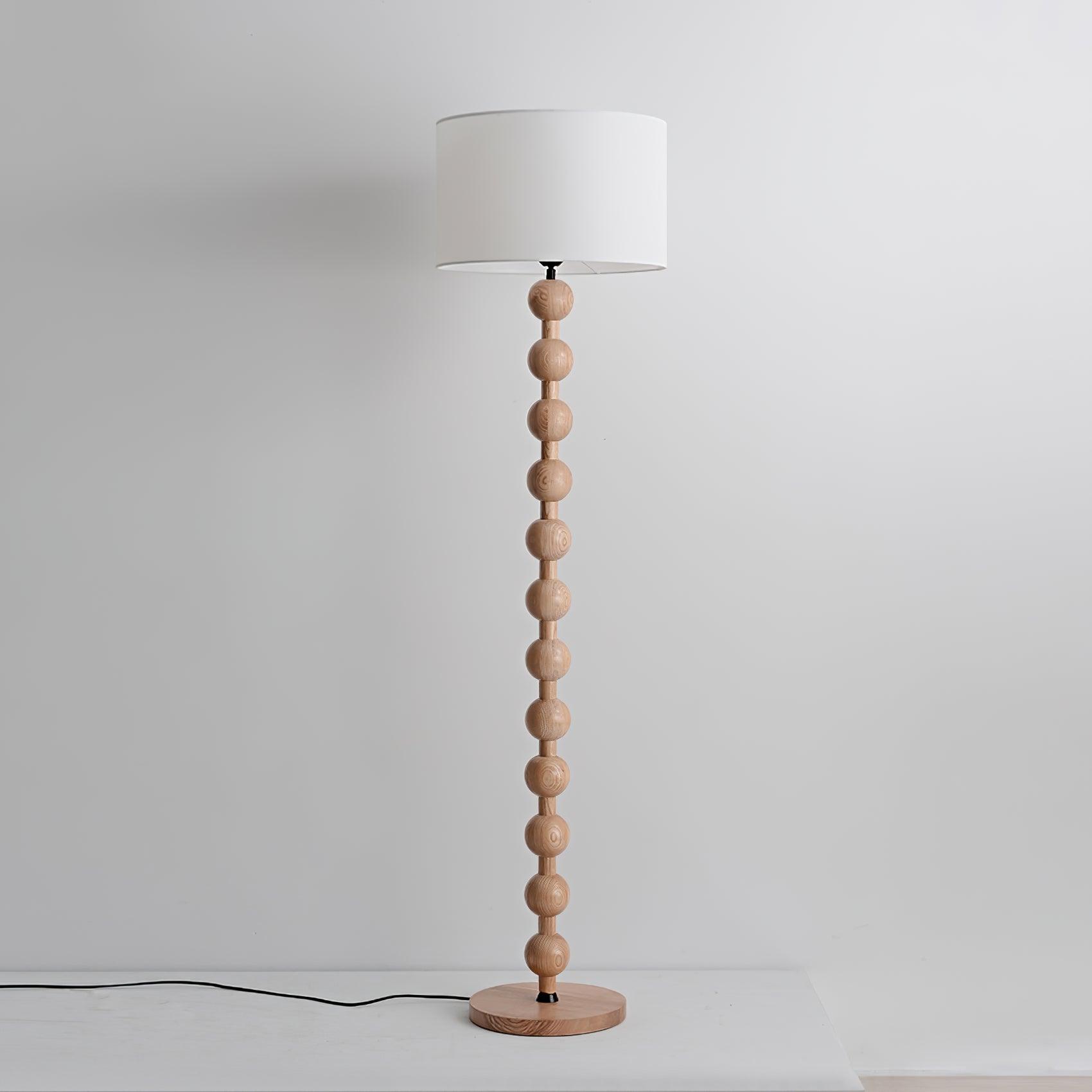 Lámpara de Pie Escultural Hugo – Luz de Piso Moderna con Esferas de Madera para Espacios de Vida