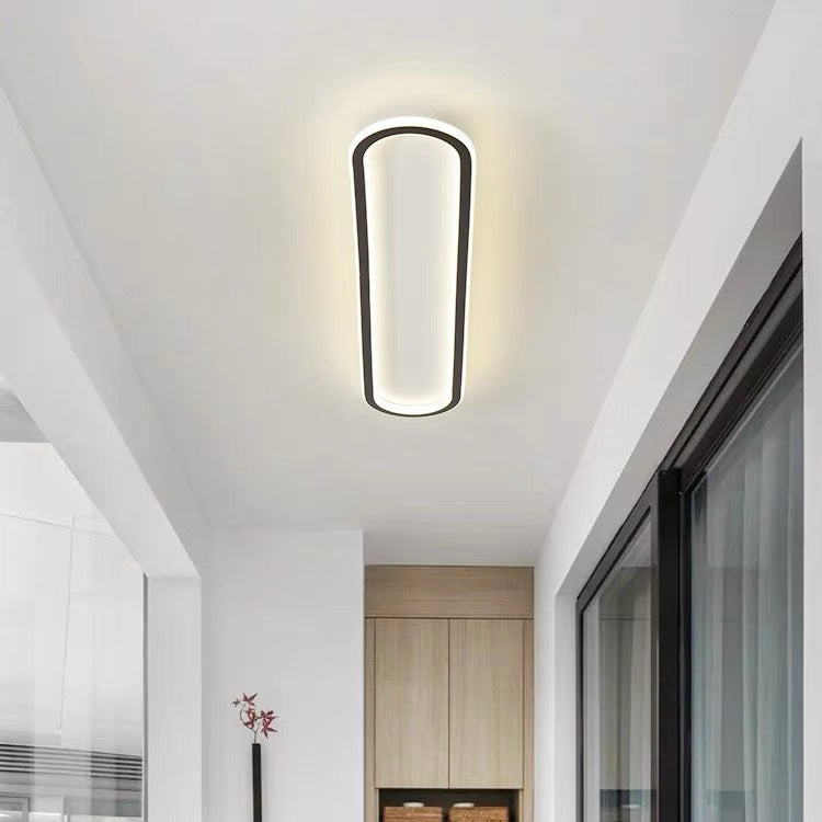 Lámpara de techo LED ovalada regulable con cambio de color – plana y moderna
