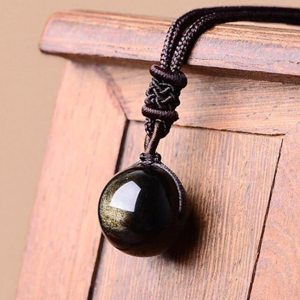 Péndulo "Esfera" en Obsidiana Dorada