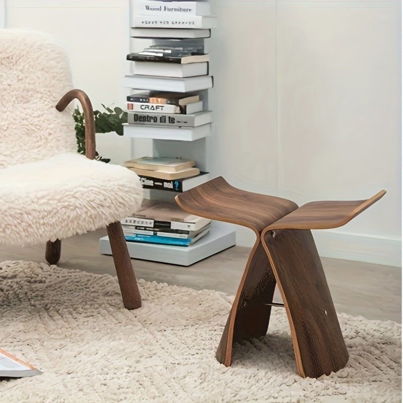 Taburete mariposa de madera maciza con un diseño atemporal, que ofrece un asiento compacto y versátil – acabado natural
