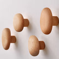 WoodCraft – Juego de 4 ganchos de pared de madera hechos a mano