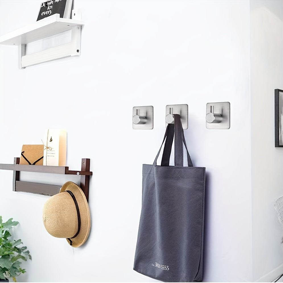 Set de Ganchos de Pared Autoadhesivos de Acero Inoxidable de 4 Piezas – Minimalista, Potente y Resistente al Agua
