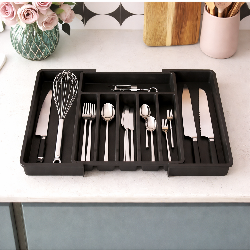 Organizador de cajón extensible y ajustable para una cocina