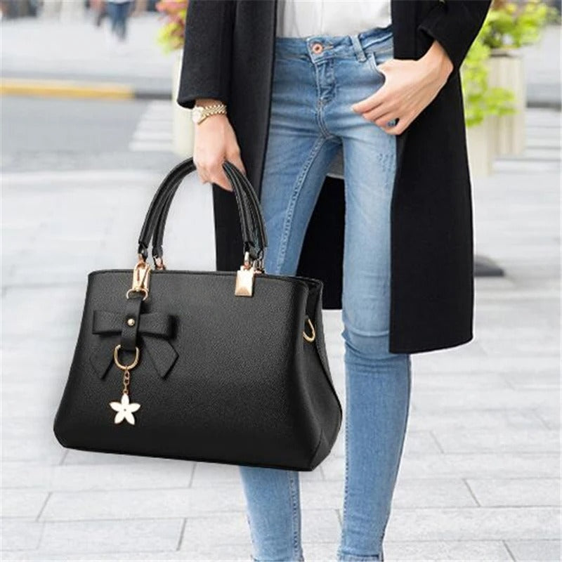 Bolso messenger para mujeres con charm de flores