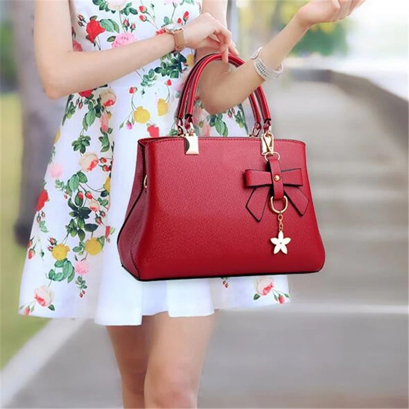 Bolso messenger para mujeres con charm de flores