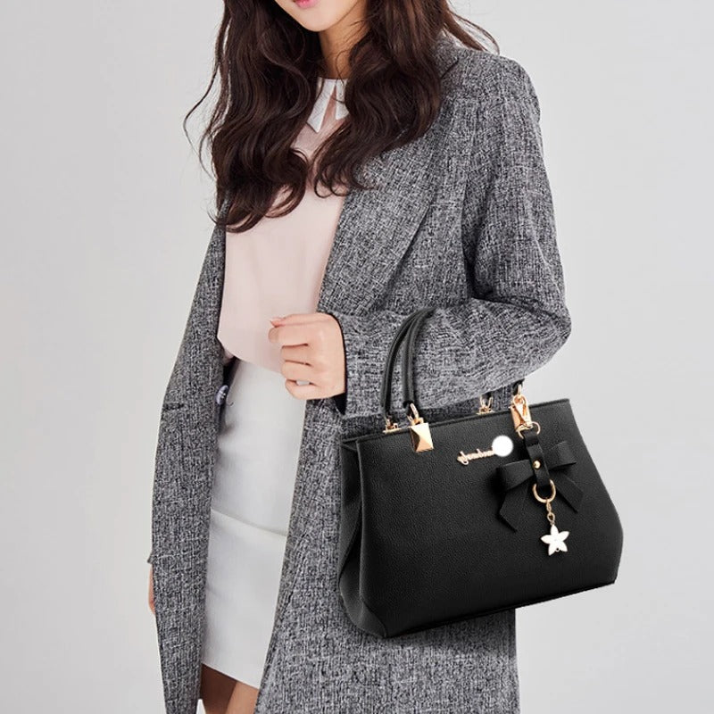 Bolso messenger para mujeres con charm de flores