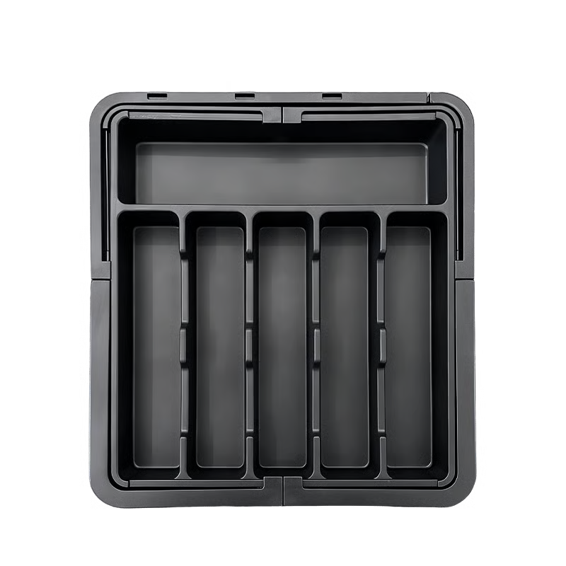 Organizador de cajón extensible y ajustable para una cocina