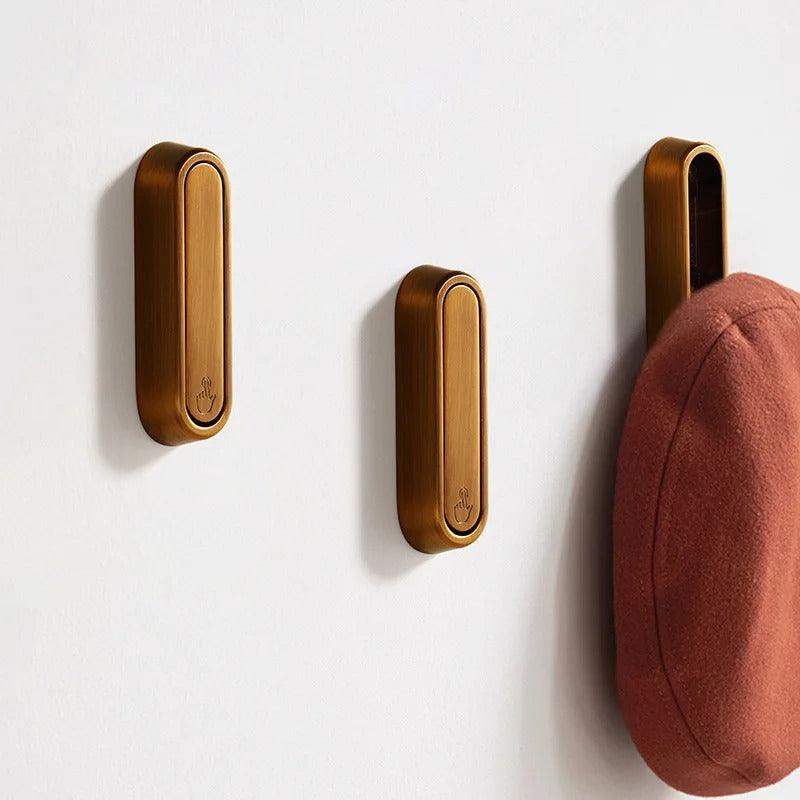 Ganchos de pared abatibles | Metal macizo