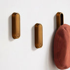 Ganchos de pared abatibles | Metal macizo