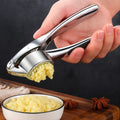 Exprimidor de Ajo Minimalista de Acero Inoxidable con Mango Antideslizante