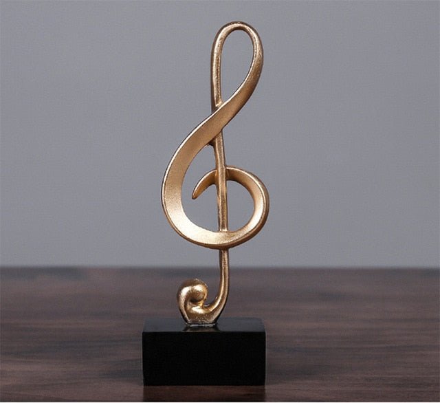 Estatuilla de Nota Musical Dorada – Adorno Decorativo para Mueble o Escritorio