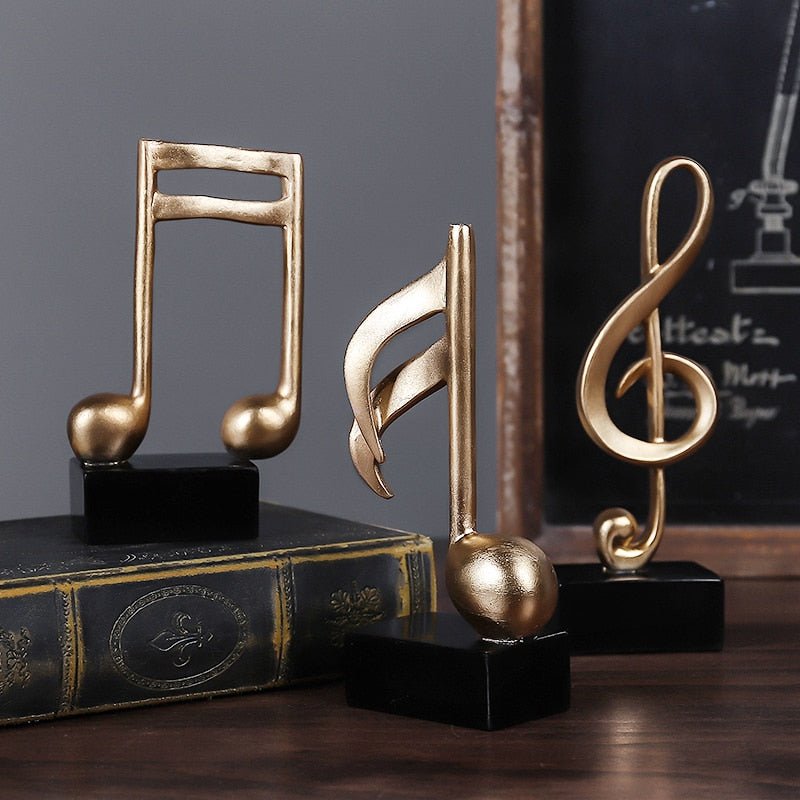 Estatuilla de Nota Musical Dorada – Adorno Decorativo para Mueble o Escritorio