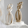 Escultura abstracta de amor eterno