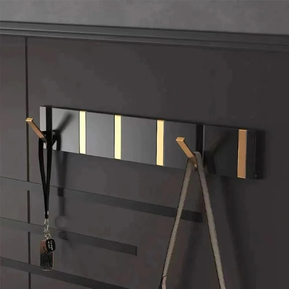 FOLDHOOK – Gancho de pared elegante con diseño plegable para un orden que ahorra espacio